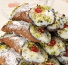 10 Cannoli Covered with Pistachios