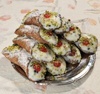 10 Cannoli Covered with Pistachios